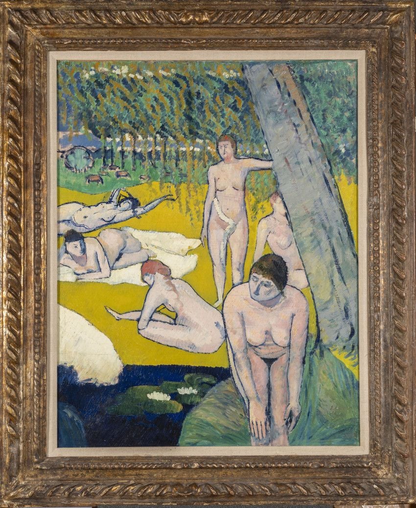 Dipinto raffigurante cinque figure nude in un paesaggio naturale, tra prati, alberi e uno specchio d’acqua. In primo piano una donna è seduta vicino a un albero; altre figure sono distese sull’erba o in piedi sullo sfondo.